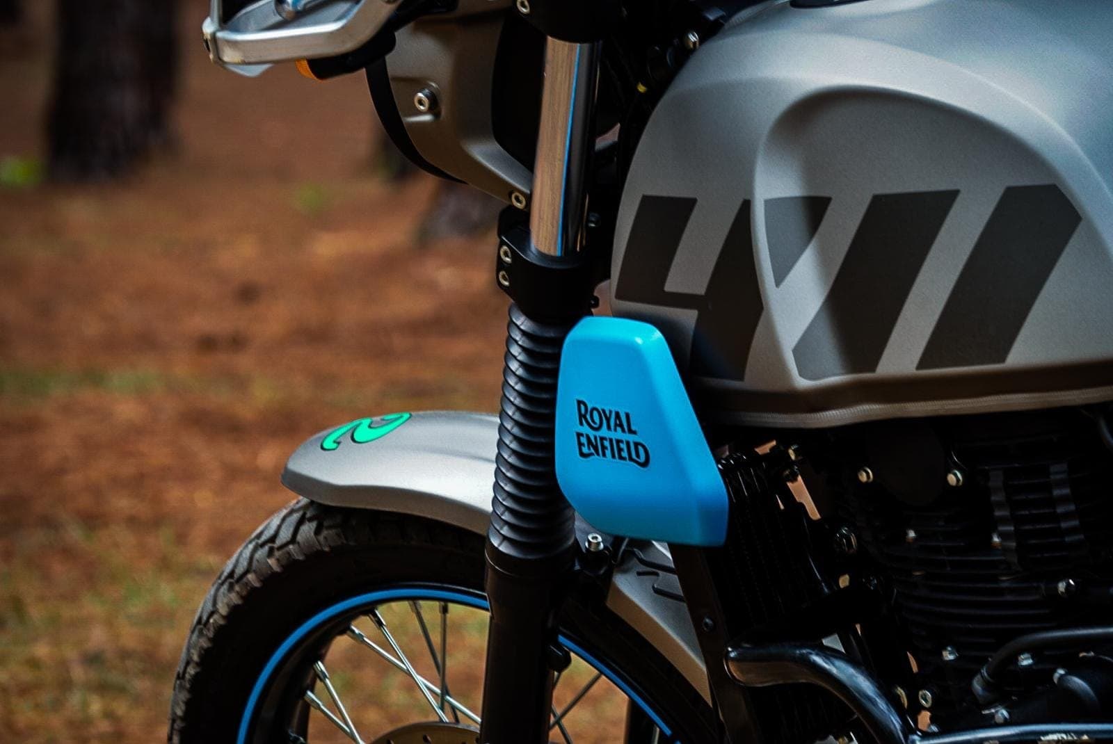 Close-up of the Royal Enfield Scram 411's tank and front fork